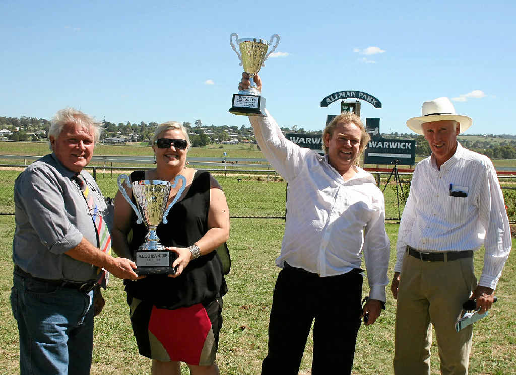 Southern Downs councillor Glyn Rees, Railway Hotel publican Robyn Miles, winner of the 2014 Railway Hotel Allora Cup Daryl Peckett and then rwick Turf Club president Jim Costello.